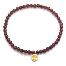 Tree of Life Garnet Gemstone Bracelet showcasing faceted garnet stones, symbolizing love and guidance. Perfect as spiritual jewelry for meditation gifts, this bracelet carries deep meaning and serves as a protective amulet for yoga and manifestation.