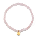 Supported In Love Lotus Rose Quartz Gemstone Bracelet showcasing a beautiful design, symbolizing love and compassion. This spiritual jewelry piece is ideal for meditation gifts and embodies meaningful qualities like manifestation and protection. Perfect for yoga enthusiasts and those seeking a sacred connection.