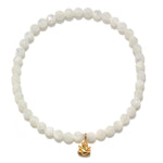 Ganesha Hindu God Pearl Gemstone Bracelet featuring mother of pearl beads and an 18kt gold plate Ganesha pendant. This spiritual jewelry piece serves as a meditation gift, embodying meaningful symbolism and protective qualities, perfect for yoga and mantra practices. Its sacred design is ideal for manifestation and carries deep meaning, making it a thoughtful zodiac amulet.