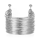 Silver Large Bangle Bracelet Cuff - Something Special, featuring sixteen hand-stamped bangles beautifully combined to create a unique cuff style that embodies spirituality, ideal for meditation, talisman use, and zodiac representation. This artisan piece reflects a meaningful aesthetic, perfect for yoga or manifestation practices, offering both protection and elegance under the sun and moon.