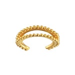 Stand By Your Side Ear Cuff, an elegant gold plate piece with dotted crescents, symbolizes spiritual jewelry and protection. Perfect for meditation practices and meaningful occasions, embracing the connection between sun, moon, and zodiac energies.