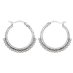 Embrace Simplicity Silver Hoop Earrings featuring a hammered design and delicate beads, perfect for adding a touch of elegance to any outfit. Ideal spiritual jewelry for meditation and meaningful moments, these earrings symbolize protection and charm in your everyday life.