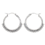 Embrace Simplicity Silver Hoop Earrings featuring a hammered design and delicate beads, perfect for adding a touch of elegance to any outfit. Ideal spiritual jewelry for meditation and meaningful moments, these earrings symbolize protection and charm in your everyday life.