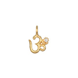 Universal Om White Topaz Charm featuring an openwork Om design, crafted in 18kt gold plate with a white topaz accent. This spiritual jewelry piece symbolizes individuality and creativity, making it a perfect talisman for meditation and yoga practice, enhancing personal manifestation and meaning.