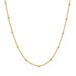 Subtle Beauty Dot Chain Choker displayed on a white background, showcasing its elegant design featuring golden dots. This spiritual jewelry piece is perfect for meditation and reflects a meaningful connection to the sun and moon.
