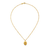 View of the Lotus Citrine Birthstone Locket Necklace - November laid flat, emphasizing its craftsmanship and the charm of its citrine stone, suitable for various spiritual and zodiac practices.