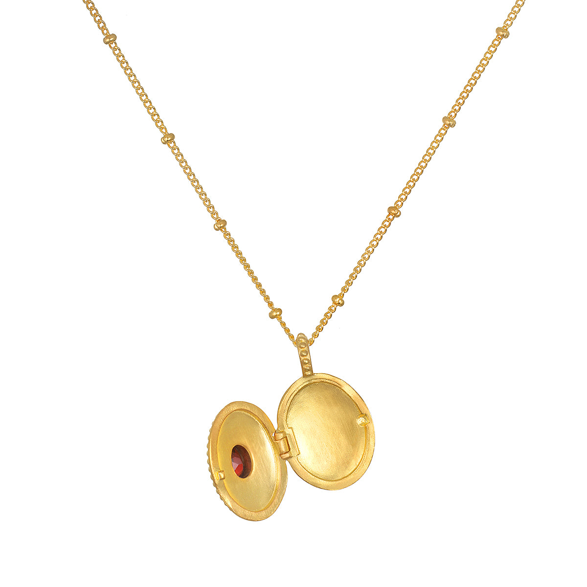 Open view of the Lotus Garnet Birthstone Locket Necklace - January, highlighting its intricate engraving and the potential to hold meaningful mementos, serving as a talisman for protection and zodiac energy.