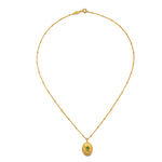 Lotus Peridot Birthstone Locket Necklace - August captured flat lay, featuring its intricate design that embodies protection and charm, making it a thoughtful gift for those seeking meaning and connection.