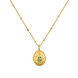 Lotus Peridot Birthstone Locket Necklace - August displayed elegantly on a white background, symbolizing new beginnings and meaningful connections in spiritual jewelry, ideal for meditation and manifestation.