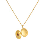 Lotus Ruby Birthstone Locket Necklace - July with the locket open, revealing space for personal keepsakes, embodying the essence of spirituality and meaning in jewelry, perfect for zodiac lovers and meditators alike.