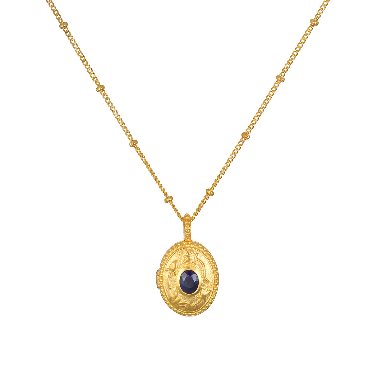 Lotus Sapphire Birthstone Locket Necklace - September displayed on a white background, featuring an 18kt gold plated locket adorned with a sparkling sapphire. This spiritual jewelry serves as a meaningful talisman, perfect for meditation and manifestation. Ideal for those seeking charm and protection in their yoga practice.