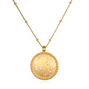 Sacred Sisterhood Constellation Necklace showcasing an 18k gold plated pendant with white topaz gemstones, embodying themes of spirituality and harmony. Perfect as a meditation gift, this necklace symbolizes sisterhood and individuality, making it a meaningful addition to your spiritual jewelry collection. Wear it as a protective amulet representing your zodiac connection.