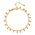Joyful Bell Bracelet featuring delicate gold bell-shaped pendants, showcasing a stunning design perfect for spiritual jewelry, meditation, and meaningful charms for your layered look.