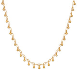 Joyful Choker Necklace featuring delicate round balls that dance gracefully along the skin, perfect for layering or wearing alone. This spiritual jewelry embodies meaning and charm, ideal for meditation and manifestation, making it a beautiful addition to any yoga practice.