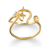 The Sacred Sounds Om Ring is beautifully designed with an adjustable 18kt gold plated band and adorned with a white topaz, making it a perfect piece of spiritual jewelry. This symbolic ring reflects the sacred Om mantra, ideal for meditation gifts and yoga enthusiasts, offering meaningful protection and connection to one's zodiac energy.