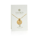 The Mandala Zodiac Taurus Emerald Necklace presented on a stylish card by Satya Jewelry, emphasizing its zodiac significance. This piece serves as a sacred talisman for Taurus, making it a perfect thoughtful gift for those seeking spiritual jewelry rich in meaning and protection.