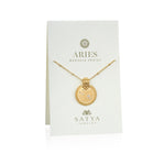 The Mandala Zodiac Aries White Topaz Necklace elegantly displayed on a branded card, emphasizing its role as a symbolic piece of jewelry. This beautiful amulet connects with the energy of the Aries zodiac, making it an ideal manifestation tool for those seeking inspiration in their spiritual practices.