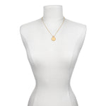 Model wearing the Mandala Zodiac Gemini Pearl Necklace, showcasing the elegant design and its significance in spiritual practices, meditation, and astrology, serving as a meaningful talisman for yoga and manifestation.