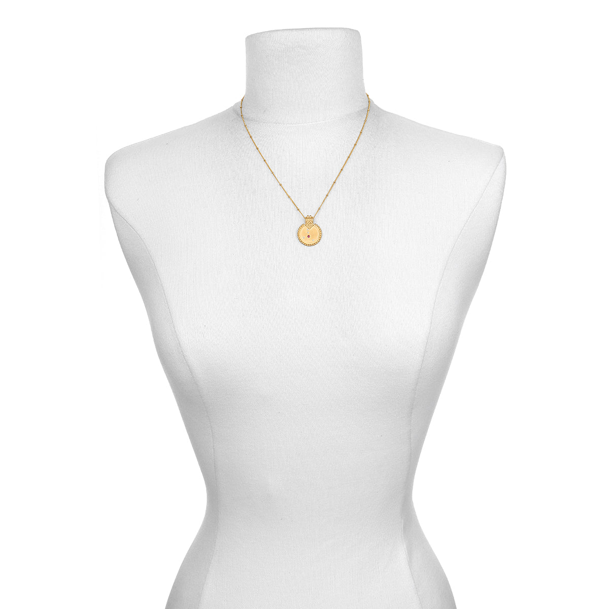 Mandala Zodiac Cancer Ruby Necklace displayed on a bust, showcasing its elegance as a meaningful talisman for manifestation and spiritual protection in the zodiac realm.