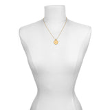Mandala Zodiac Cancer Ruby Necklace displayed on a bust, showcasing its elegance as a meaningful talisman for manifestation and spiritual protection in the zodiac realm.