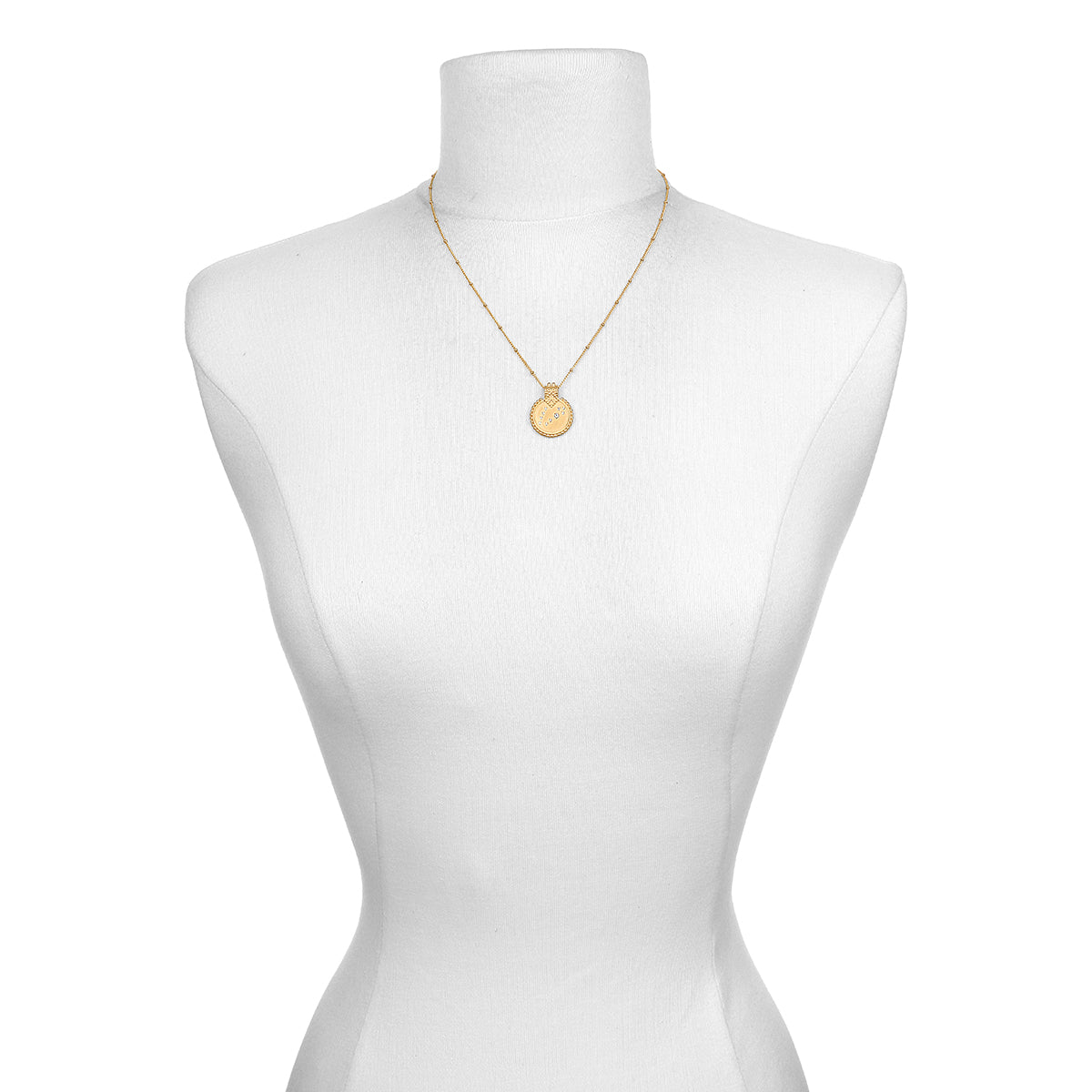 The Mandala Zodiac Pisces Aquamarine Necklace displayed on a mannequin, representing a meaningful accessory for those seeking spiritual connection through symbolic zodiac jewelry.