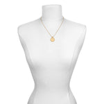 The Mandala Zodiac Pisces Aquamarine Necklace displayed on a mannequin, representing a meaningful accessory for those seeking spiritual connection through symbolic zodiac jewelry.