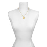 The Mandala Zodiac Pisces Aquamarine Necklace displayed on a mannequin, representing a meaningful accessory for those seeking spiritual connection through symbolic zodiac jewelry.