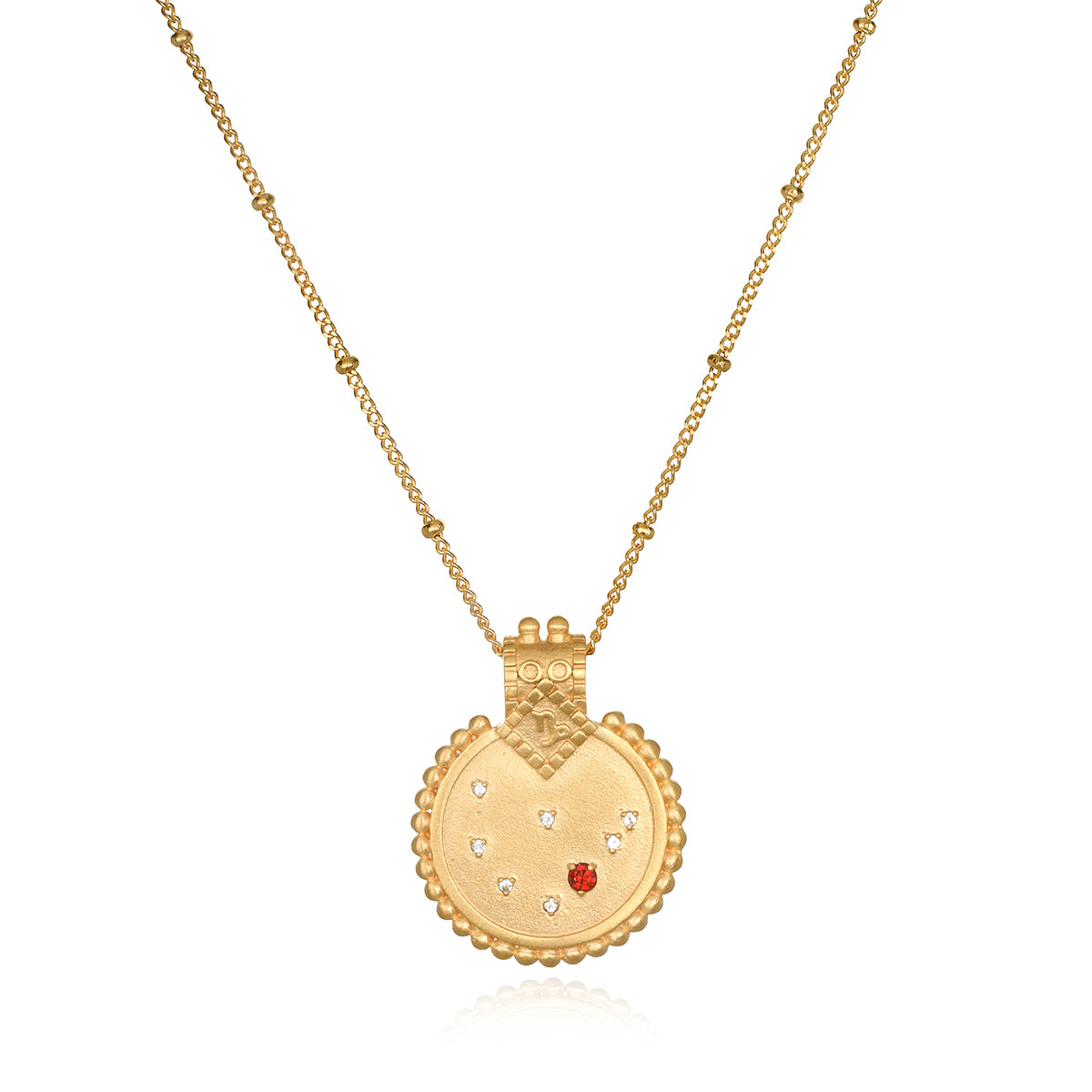 Mandala Zodiac Capricorn Red Garnet Necklace featuring intricate gold craftsmanship, perfect for spiritual jewelry and meditation gifts. This necklace serves as a meaningful and protective amulet, symbolizing the Capricorn zodiac sign and enhancing your yoga practice and manifestation goals.