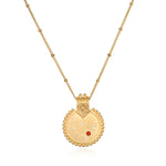 Mandala Zodiac Capricorn Red Garnet Necklace featuring intricate gold craftsmanship, perfect for spiritual jewelry and meditation gifts. This necklace serves as a meaningful and protective amulet, symbolizing the Capricorn zodiac sign and enhancing your yoga practice and manifestation goals.