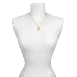 Mandala Zodiac Capricorn Red Garnet Necklace showcased on a minimalist dress form, symbolizing protection and spiritual significance, perfect as a meditation gift or sacred accessory for zodiac lovers.