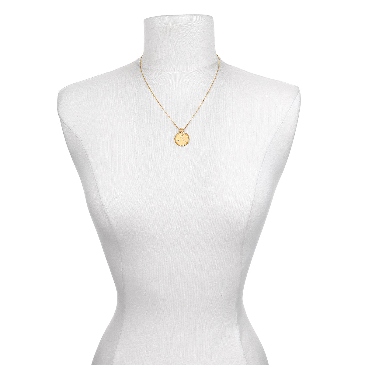 The Mandala Zodiac Virgo Sapphire Necklace on a mannequin, emphasizing its beauty and style. An ideal talisman for those seeking spiritual growth, this necklace embodies the qualities of the Virgo zodiac, sun, moon, and the power of manifestation.