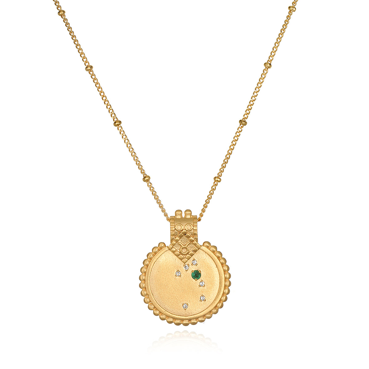 The Mandala Zodiac Taurus Emerald Necklace displayed elegantly, featuring the emerald stone and crafted in 18kt gold plate. This spiritual jewelry captures the essence of Taurus, making it a perfect meditation gift and a meaningful amulet for manifestation with protective and sacred qualities.