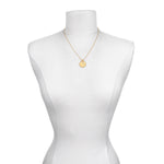 Mandala Zodiac Taurus Emerald Necklace displayed on a mannequin, highlighting its beauty as a piece of spiritual jewelry. A symbolic representation for Taurus, this necklace is ideal for meditation gifts and meaningful manifestations.