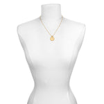 The Mandala Zodiac Aquarius Amethyst Necklace displayed on a mannequin, emphasizing its unique design that resonates with those who appreciate meaningful and protective spiritual jewelry. This necklace is a beautiful representation of the zodiac, perfect for manifestation and yoga.