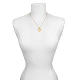 Mandala Zodiac Leo Peridot Necklace displayed on a mannequin, showcasing its design and connection to spiritual practices, yoga, and manifestation features related to the fire sign Leo.