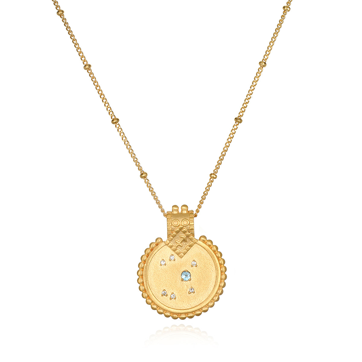Mandala Zodiac Sagittarius Blue Topaz Necklace featuring a vibrant gold pendant, embodying spiritual jewelry that enhances meditation and serves as a talisman for protection and meaningful manifestation, ideal for yoga enthusiasts.
