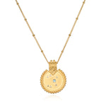 Mandala Zodiac Sagittarius Blue Topaz Necklace featuring a vibrant gold pendant, embodying spiritual jewelry that enhances meditation and serves as a talisman for protection and meaningful manifestation, ideal for yoga enthusiasts.
