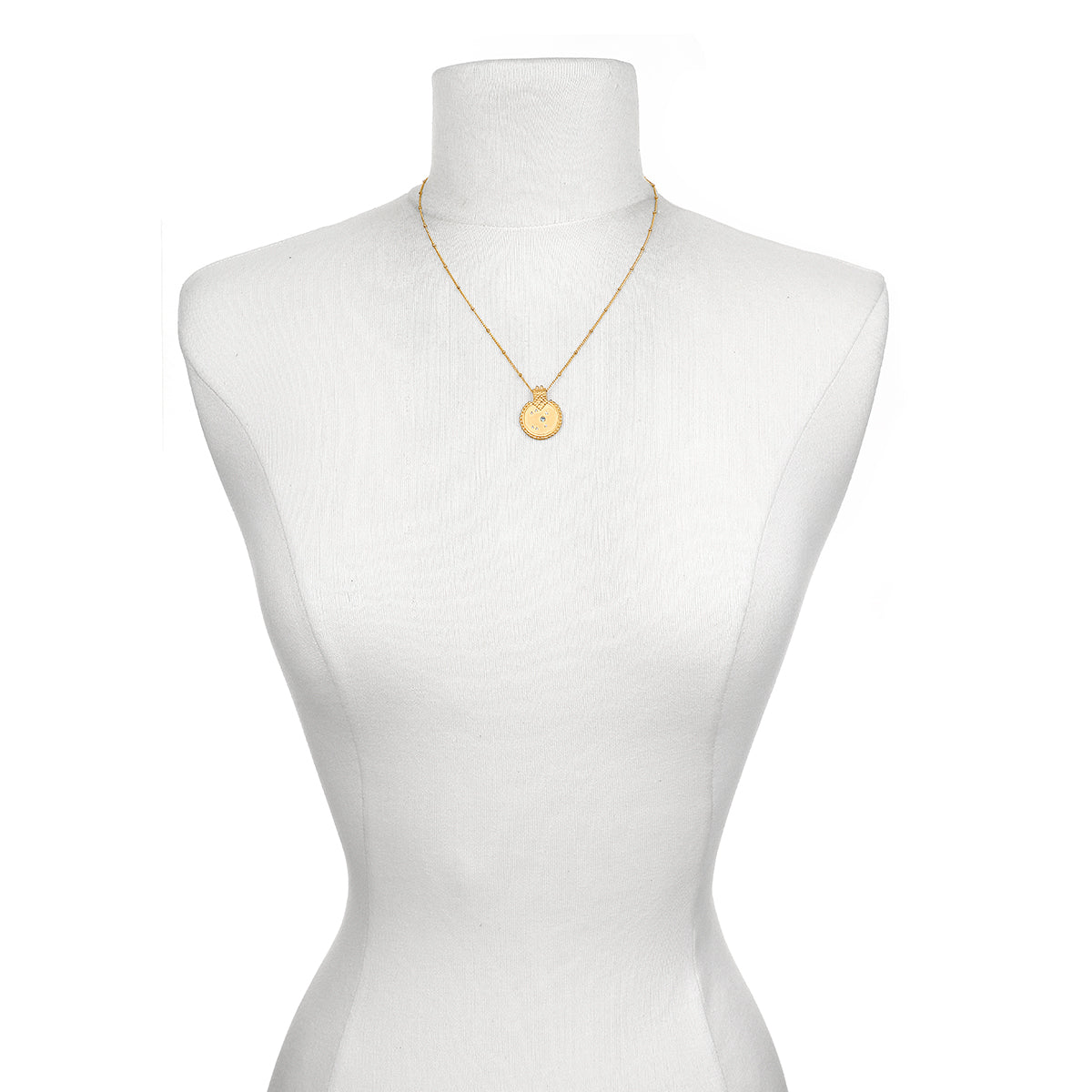 Mandala Zodiac Sagittarius Blue Topaz Necklace displayed on a mannequin, showcasing its beauty as spiritual jewelry, perfect for meditation and representing the meaning of zodiac energies and manifestations.