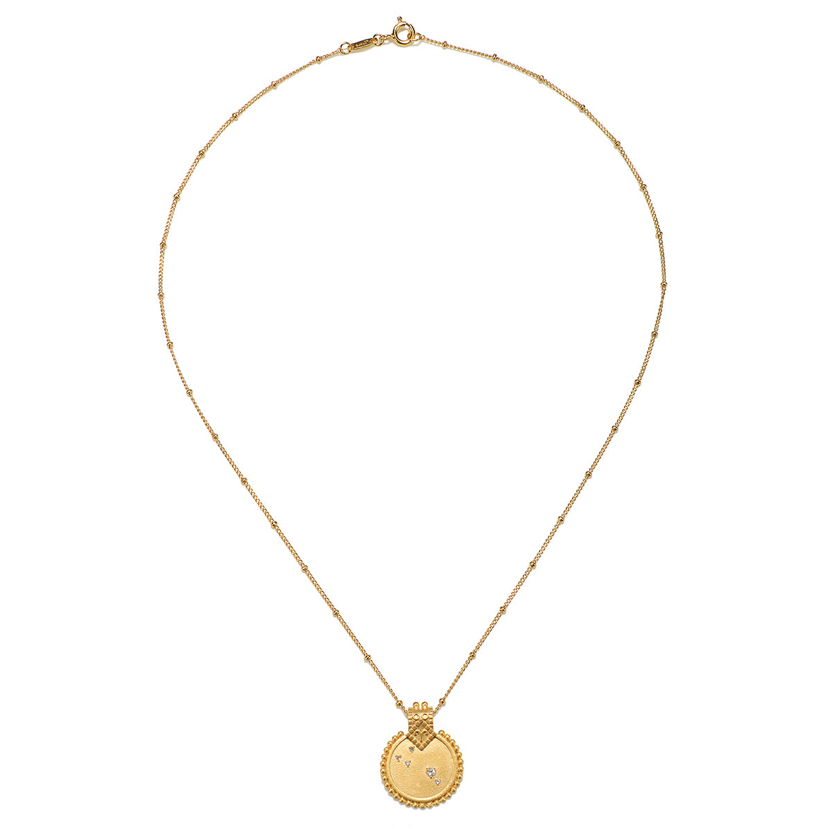 The Mandala Zodiac Aries White Topaz Necklace showcasing its detailed round pendant and chain. This meaningful piece of spiritual jewelry is perfect for yoga enthusiasts and those interested in zodiac symbolism, embodying protection and the essence of individualism and creativity.