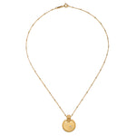 The Mandala Zodiac Aries White Topaz Necklace showcasing its detailed round pendant and chain. This meaningful piece of spiritual jewelry is perfect for yoga enthusiasts and those interested in zodiac symbolism, embodying protection and the essence of individualism and creativity.