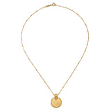The Mandala Zodiac Aries White Topaz Necklace showcasing its detailed round pendant and chain. This meaningful piece of spiritual jewelry is perfect for yoga enthusiasts and those interested in zodiac symbolism, embodying protection and the essence of individualism and creativity.