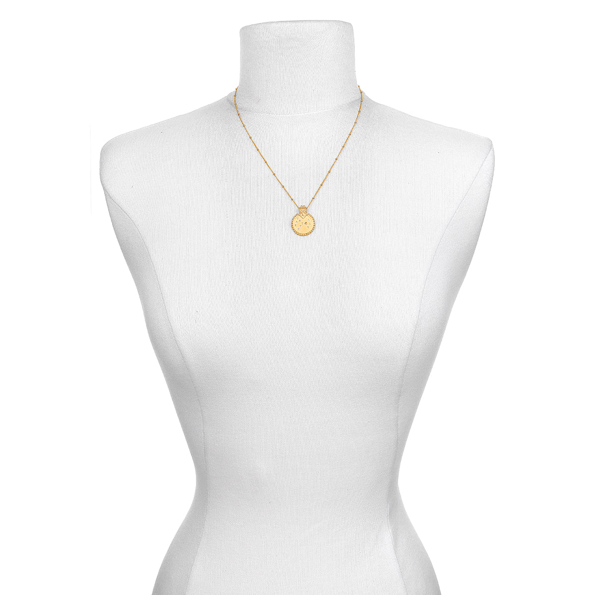 The Mandala Zodiac Scorpio Citrine Necklace displayed elegantly on a mannequin, emphasizing its beauty as spiritual jewelry. This talisman represents the zodiac's energy, ideal for meditation, fostering a meaningful connection to the sun, moon, and personal manifestation.