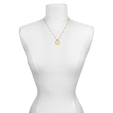 The Mandala Zodiac Scorpio Citrine Necklace displayed elegantly on a mannequin, emphasizing its beauty as spiritual jewelry. This talisman represents the zodiac's energy, ideal for meditation, fostering a meaningful connection to the sun, moon, and personal manifestation.