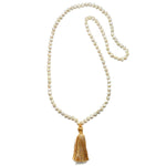 Wisdom Lotus Pearl Gemstone Mala displayed elegantly, ideal for spiritual use, meditation, and as a meaningful talisman, representing protection and the energy of the zodiac during yoga and reflection.