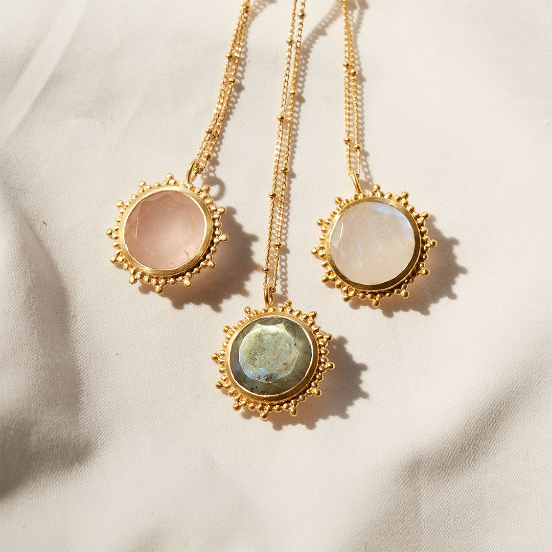 Drift Into Daydreams Moonstone Gemstone Necklace featuring three stunning moonstone pendants surrounded by beaded starburst designs, ideal for spiritual jewelry, meditation, and as a talisman representing zodiac meanings, protection, and manifestation during yoga.