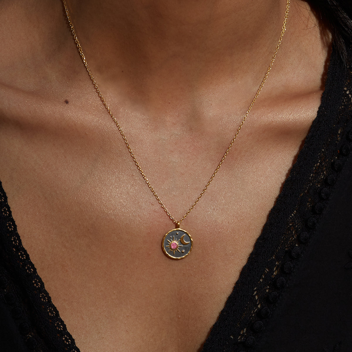 Close-up of the Celestial Birthstone Necklace - October worn by a model, showcasing the meaningful sun and moon pendant. This spiritual jewelry accentuates themes of spiritual connection and reflects the essence of zodiac energies while being ideal for meditation and personal meaning.