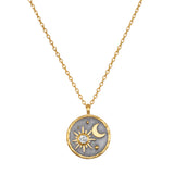 Celestial Birthstone Necklace - April featuring a stunning sun and moon design in 18kt gold plate against a gunmetal background. This spiritual jewelry piece symbolizes individuality and creativity, perfect for meditation and manifestation. Ideal for yoga enthusiasts seeking meaningful talismans for protection and spiritual growth.