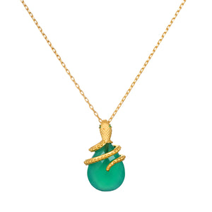 Guiding Energy Green Onyx Snake Necklace featuring a vivid green onyx stone cradled by a serpent in 18kt gold plating. This spiritual jewelry symbolizes grounding and guidance, perfect for meditation and protection rituals. Ideal for zodiac enthusiasts, this meaningful talisman enhances manifestation during yoga or other spiritual practices.