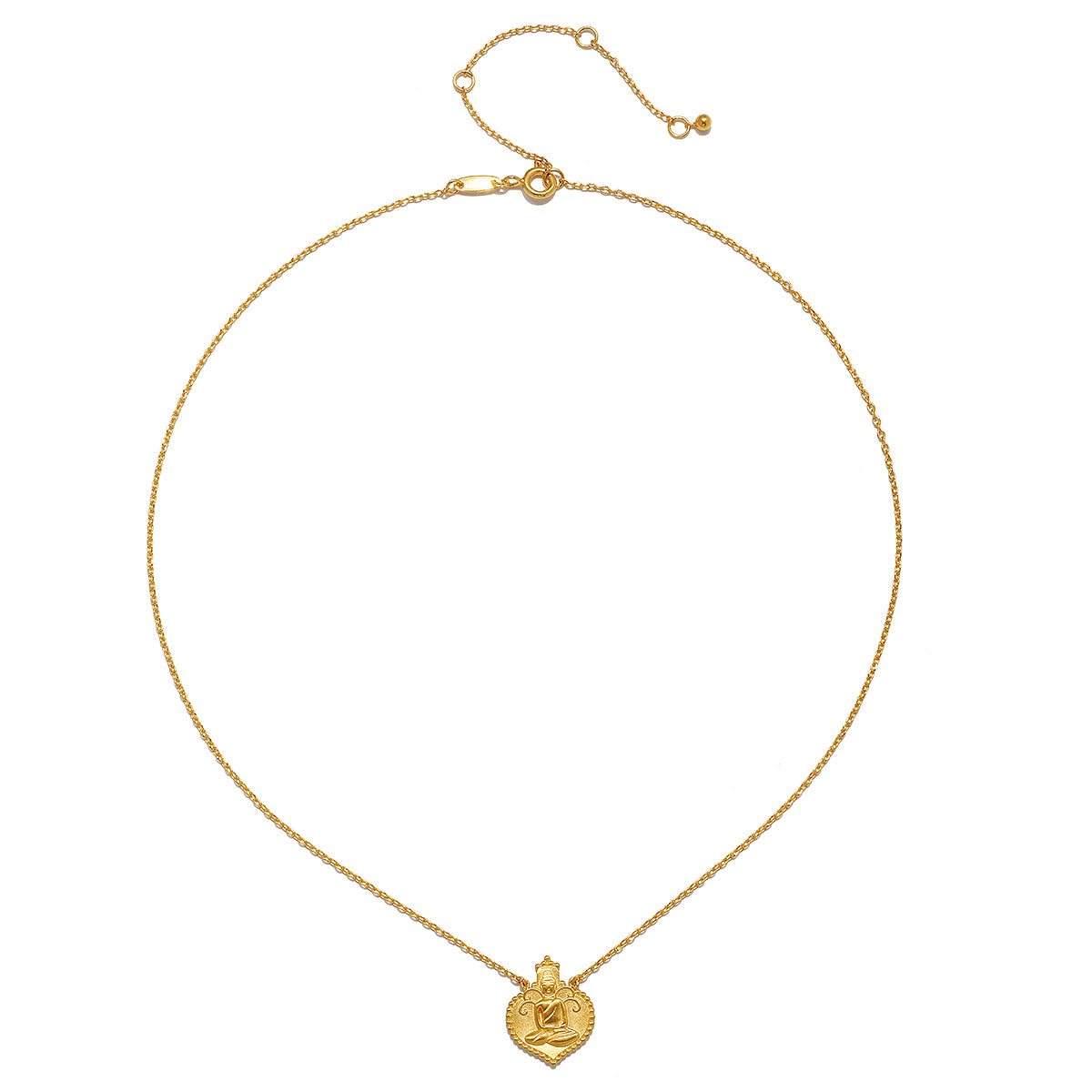 Close-up of the Peaceful Buddha Gold Necklace, featuring a heart-shaped 18kt gold pendant engraved with Buddha in a lotus position. This piece of spiritual jewelry is a thoughtful talisman for meditation and manifestation, embodying a connection to the sun, moon, and the deeper meanings of tranquility and wisdom.