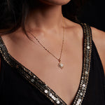 Model wearing the North Star Moonstone Starburst Necklace, showcasing its beauty and significance in spiritual jewelry. This piece symbolizes guidance and charm for meditation and zodiac practices, ideal for anyone seeking meaningful adornment.